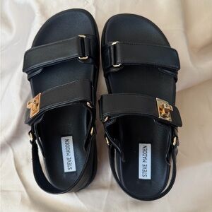 Steve Madden Black Sandals with Gold Accents